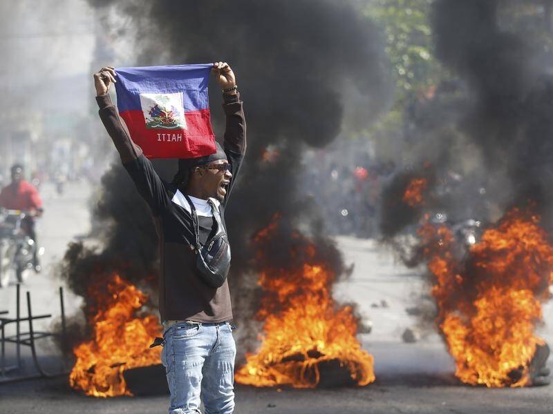 Heavy gunfire and traffic disruptions were seen in some areas of Haiti's capital. (AP PHOTO)